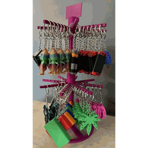 Custom 3D-printed keychains on a display rack, showcasing variety and personalization options.